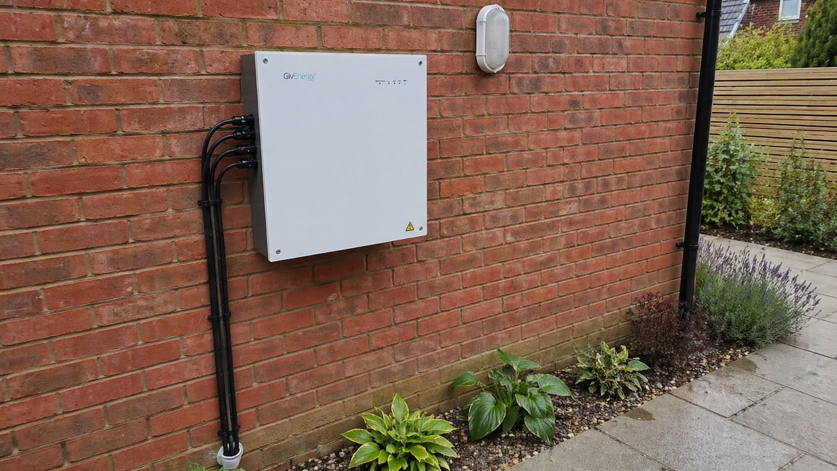Modern home battery storage system wall-mounted in a utility room