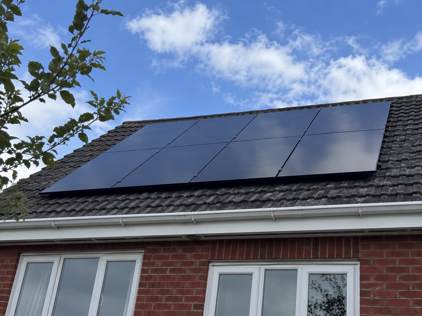 Solar panels generating clean electricity on a residential rooftop